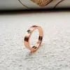 Anillo de Diamante de Acero de Titanio Oro Rosa de Alta Gama Anillo de Firma con Tarjeta de Venta en Vivo Más Vendido para Hombres y Mujeres Anillos de Pareja Estilo Moderno