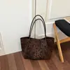 Bolso tote transfronterizo 2026 nuevo con estampado de leopardo, bolso de hombro de gran capacidad para mujer, con un diseño sofisticado, retro y moderno, un bolso de mano versátil