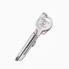 Llavero multifuncional ocho en uno colgante de mano herramienta destornillador portátil accesorios cuchillo mini plegable venta al por mayor