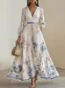 Primavera/Outono 2026 Novo Estilo Transfronteiriço Europeu e Americano Comércio Exterior Roupas Femininas Estampado Decote V Manga Longa Moda Vestido Plissado Saia Longa Feminina