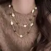 Nuevo collar de perlas artificiales de doble capa, cadena para la clavícula de moda exquisita transfronteriza, cadena de suéter de lujo ligero estilo francés