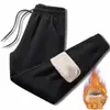 Calça de Algodão com Lã de Cordeiro Masculina Inverno Tamanho Grande Solta Forrada com Fleece Espessada Jovem Casual Resistente ao Frio Quente Roupa Externa Calça Esportiva