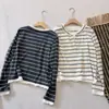Nueva camiseta de moda coreana para principios de otoño, cuello redondo, bloques de color, estilo dos piezas falsas, manga larga para mujer, top holgado y estilizado para mujer