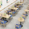 Mesa y Sillas de Comedor para Comedor de Empleados Mesas y Sillas de Madera Maciza para Tienda de Té de Leche Mesas y Sillas para Restaurante de Comida Rápida Gourmet de Catering Combinación de Cabina con Sofá