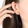 Pendientes de acero de titanio populares con temperamento de sensación de metal europeo y americano, joyería con personalidad, patrón de estrella y luna, joyería redonda que no se decolora