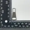 En stock al por mayor cremallera metálica #3#5 tirador de círculo cara sonriente tarjeta tiradora bolsa bolsa de cosméticos accesorios decorativos para ropa