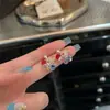 Corea del Sur Dongdaemun Globos de Amor Esmaltados de Colores Hebilla de Oreja de Perro Pendientes de Corazón Dulce y Femenino Pendientes Texturizados