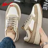 Zapatos de tirar zapatillas de hombre otoño 2026 modelo nuevo cuero impermeable moda versátil zapatos deportivos zapatos casuales para hombre