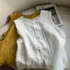 Chal sin mangas de color liso de moda coreana 2025 Verano Nuevo de un solo botón de ramio blanco con cuello redondo Top versátil para mujer