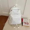 Mochila para estudiante universitario de gran capacidad, simple y linda, con estampado de estrellas, tela Oxford, venta directa de fábrica, 2026
