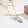 Nuevo collar de lazo de amor con circonita de diamante rosa para mujer, diseño de nicho de lujo ligero, cadena para la clavícula con circonita de diamante púrpura de alta gama
