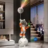 Proyección de cielo estrellado astronauta decoración de sala de estar, gran mueble de TV de pie adorno, regalo de inauguración de casa nueva
