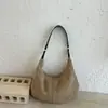 Bolsa Pequena Suede Retrô Feminina 2026 Novo Estilo Relaxada Fosca Bolsa Bolinho Outono Inverno Alta Qualidade Para o Trabalho Bolsa de Ombro