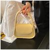 Bolso bandolera versátil para mujer 2025 Nuevo diseño nicho de primavera y verano Bolso europeo suave de alta gama Bolso de hombro de mano Venta al por mayor