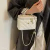 Bolso bandolera para mujer para ir al trabajo, bolso tipo cubo con cadena, patrón de diamante de nicho, nuevo modelo de moda 2026, bolso de hombro versátil, súper popular en otoño