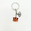 Joyería Transfronteriza Logo del Equipo de Fútbol Americano de la NFL Llavero con Goteo de Aceite Colgante para Bolso Llave de Coche