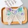 Nuevo Organza Color Mágico Lentejuelas Estéreo Lazo Dibujos Animados Ropa Infantil Accesorios para el Cabello Zapatos Sombreros Bolso Tela Adhesivos