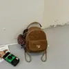 Shuai Mijia 2026 Nova Coleção Outono: Mochila Estilosa Estilo Coreano com Design de Luxo, Apresentando uma Alça de Corrente e uma Delicada Bolsa Transversal
