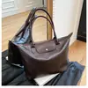 Nueva Moda Versátil Otoño 2025 Bolsa Tote de Tela de Nylon para Viajes Cotidianos Gran Capacidad Bolsa de Compras Bolsa de Mamá Bolsa de Viaje