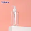 En stock Xumin 200ml botella PET blanca de hombro plano transparente/esmerilada fondo redondo cabeza de bomba PP botella dispensadora de emulsión