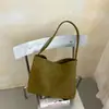 Nueva colección de principios de otoño de 2026: bolso tote tejido de patrón simple, elegante y moderno estilo coreano, perfecto para ir al trabajo, con un diseño único y alto atractivo estético