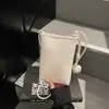 Bolso pequeño de moda transfronterizo 2026 nuevo bolso para mujer versátil ligero bolso de hombro cruzado bolso simple para commuter para teléfono