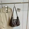 Mochila de viaje para commuting de gran capacidad, nuevo estilo verano 2026, bolso de hombro personalizado, bolso liso para mujer de alta apariencia