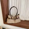 Bolso de mano retro de gamuza de nicho para otoño para mujer, nuevo bolso tote de moda 2026, bolso de hombro de gran capacidad para el día a día