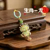 Adornos del zodíaco de brocado de canción, colgantes del año de nacimiento, llaveros, dijes para bolsos, dijes para coche, pequeños colgantes hechos a mano