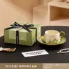 Conjunto de presente de xícara e pires de café de cerâmica de alta qualidade e requintado, perfeito como uma lembrança elegante ou um pequeno presente prático para o chá da tarde.
