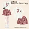 2026 Novo Estilo Suéter College Doce de Manga Curta para Meninas Conjunto de Verão Cartoon Estiloso Xadrez Bolo Saia Conjunto de Duas Peças
