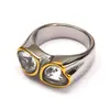 Diseño de nicho ins europeo y americano lujo ligero anillo de titanio y acero con gema en forma de corazón moda femenina corazón anillo de oro de 18 quilates al por mayor