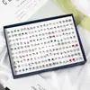 100 pares de pendientes de plástico sencillos en caja, pequeños y frescos, con gotas de aceite, geométricos, chapados en oro, con diamantes, venta al por mayor de fábrica.