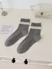 Calcetines lisos de estilo coreano para Otoño/Invierno 2026 con estampado floral, lunares y ribete de encaje, altura hasta la mitad de la pantorrilla