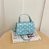 Otoño 2026 Nuevo Bolso Cuadrado Pequeño de Lunares para Mujer Fresco Gran Capacidad Bolso de Hombro de Mano Moda Bolso Pequeño Venta al por Mayor Bolso de Mujer