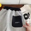 Calça de moletom Kino de inverno para meninos e meninas, estilo coreano, versátil, calça casual espessa, roupas infantis de Huzhou Zhili, calça comprida infantil