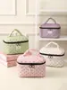 Bolsa de maquillaje con bloques de color en forma de corazón transfronteriza, portátil para salidas, con un diseño fresco y elegante, perfecta para viajes y artículos de tocador