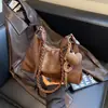 Mochila Tote de Grande Capacidade Transfronteiriça Feminina 2026 Nova Moda Bolsa de Ombro Único Cor Sólida de Nicho Bolsa de Mão Transversal
