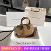 Bolsa de concha de flor antiga de luxo 2024 nova bolsa de mão sensação de alta qualidade bolsa de balde para o dia a dia atacado