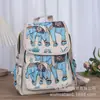 Mochila casual de doble uso tejida y bordada con jacquard de hilo de oro de estilo étnico, perfecta para viajar en Yunnan