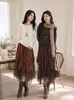 Falda Irregular Hueca Estilo Dulce y Picante Vintage para Mujer Feiyuan, Nueva Falda de Malla con Retazos de Color Sólido para Principios de Otoño