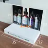 XiuLiKe expositor acrílico para cosméticos stand de estudio vitrina para productos de cuidado de la piel expositor
