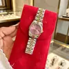 Nuevo Modelo Tono Dorado Emperatriz Azul Hielo Calendario Esfera Pequeña Correa de Acero Reloj de Cuarzo para Mujer Rosa Flor de Cerezo Venta al por Mayor