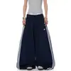 Pantalones de chándal deportivos de retazos a rayas para mujer y hombre, pantalones de baile holgados de pierna ancha para otoño, pantalones versátiles y adelgazantes de largo completo