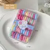 Nuevos Accesorios para el Cabello al por Mayor Niñas Pequeñas y Niños Anillo de Toalla Pequeño Circular sin Costuras Caja Completa de unas 60 Gomas para el Cabello Diadema