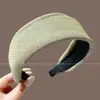 Faixa de cabeça larga de tricô minimalista e elegante estilo coreano para mulheres, novo modelo 2026, adequada para uso diário, projetada para realçar a aparência da linha do cabelo e pode ser usada como faixa de cabeça para lavar o rosto ou presilha de cabelo