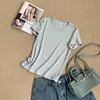 Mousse algodón de bambú doble cuello redondo manga corta verano simple cuello expuesto clavícula cuello redondo holgado casual juvenil elegante top Camiseta