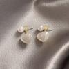 Pendientes de flores con gotas de aceite blanco y aguja de plata, elegantes y nuevos, de Corea del Sur, ligeros, lujosos y de alta calidad.
