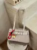 Bolso de Mano Vintage de Gran Capacidad para Mujer 2026 Nuevo Elegante Bolso Tejido de Hombro Único Nicho Versátil para Viajes Diarios