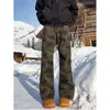 Jeans camuflaje bootcut de corte inclinado color verde militar para hombre, pantalones vintage lavados y desgastados, pierna recta microacampanada, pantalones largos
